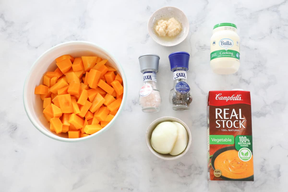 A marble counter with ingredients for Thermomix pumpkin soup