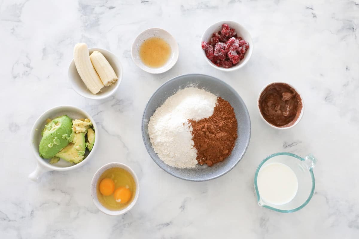 all ingredients for healthy brownies laid out on a table.