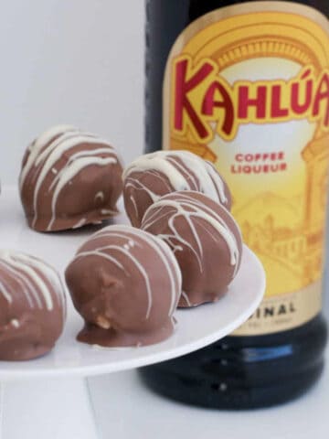 A plate filled with kahlua cheesecake balls.