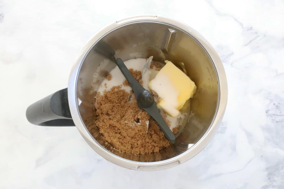 Butter and sugars in a Thermomix bowl.