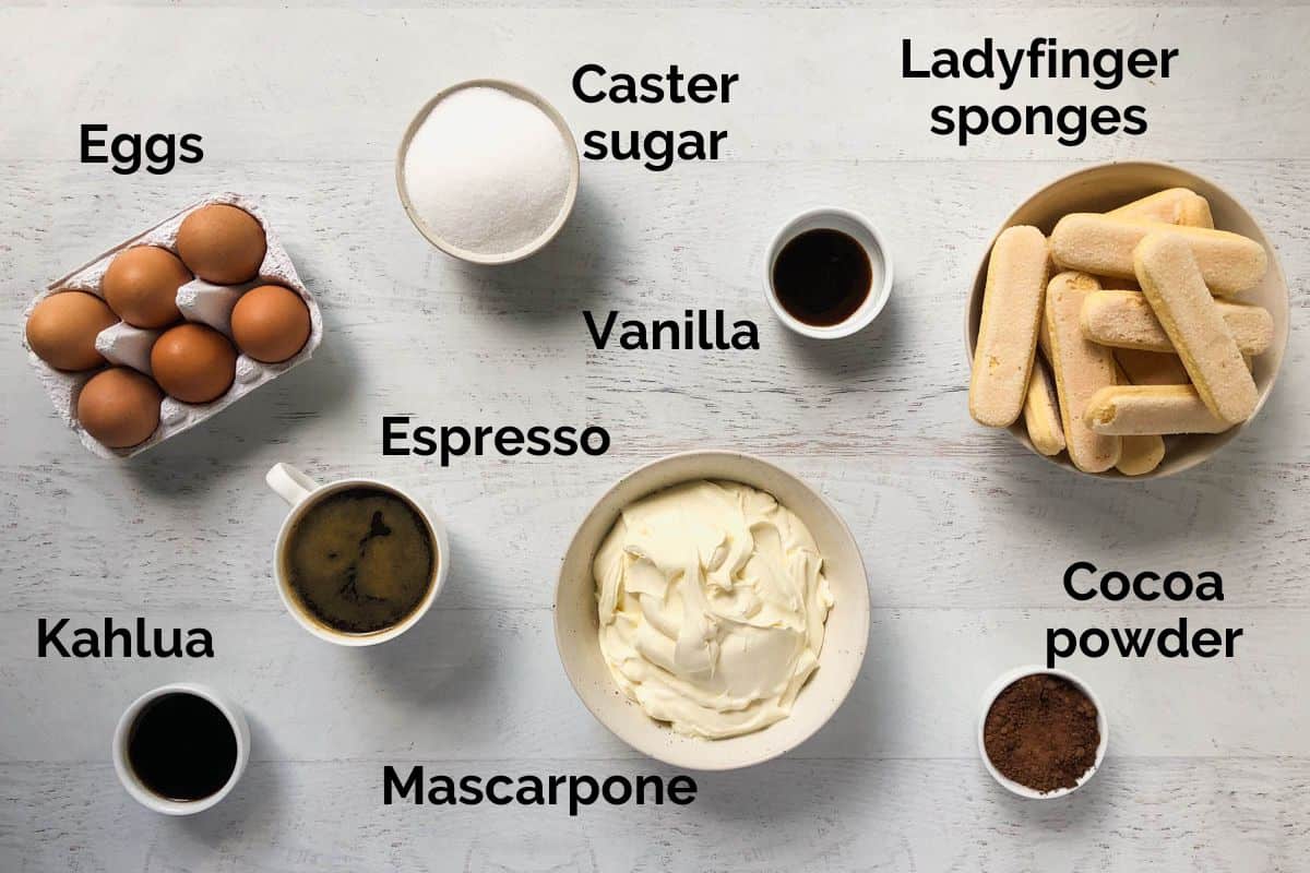 all ingredients for tiramisu laid out on a table.