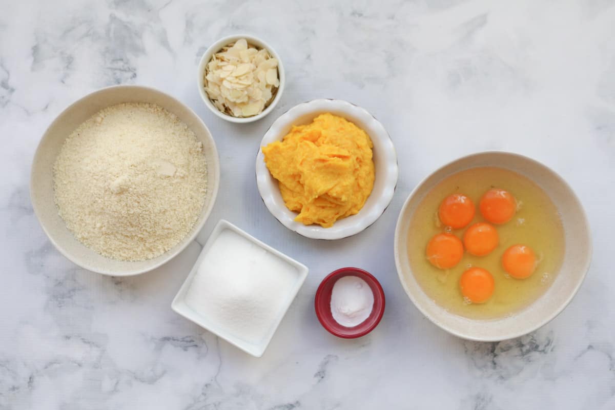 The ingredients for a flourless orange almond cake.