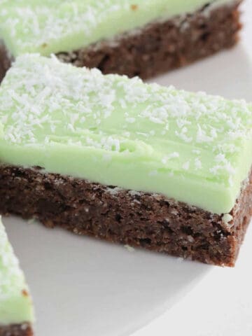 Pieces of chocolate slice with a green peppermint icing.