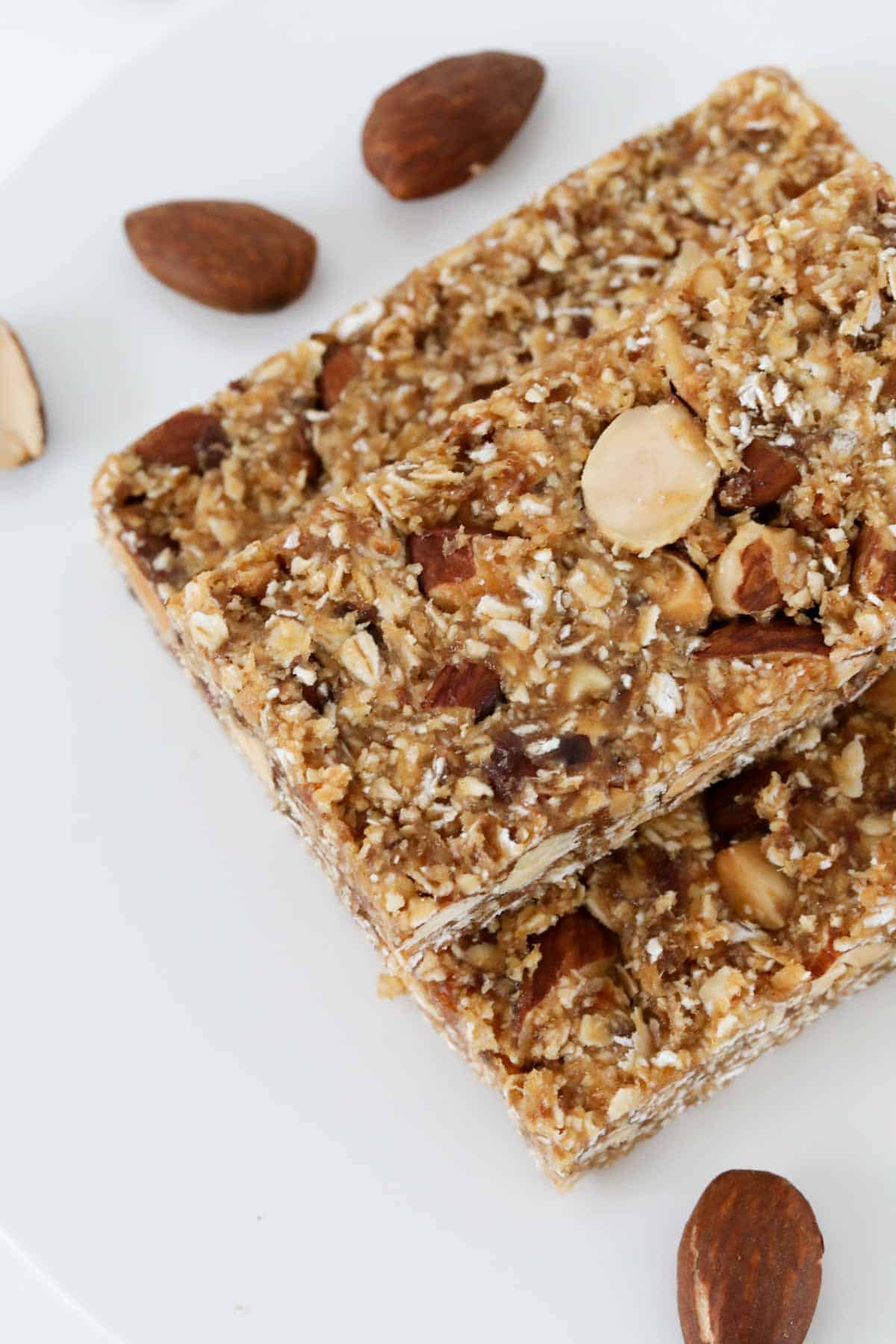An overhead shot of date energy bars with oats and almonds.