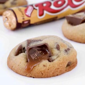 Chocolate chip cookies with gooey chocolate caramels spilling out.