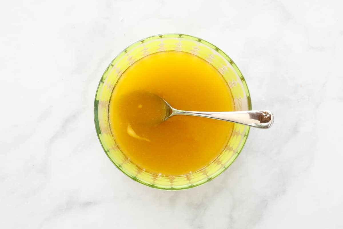 Melted butter and honey in a bowl.