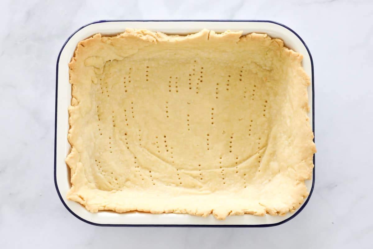 Baked shortcrust pastry in a pie dish.