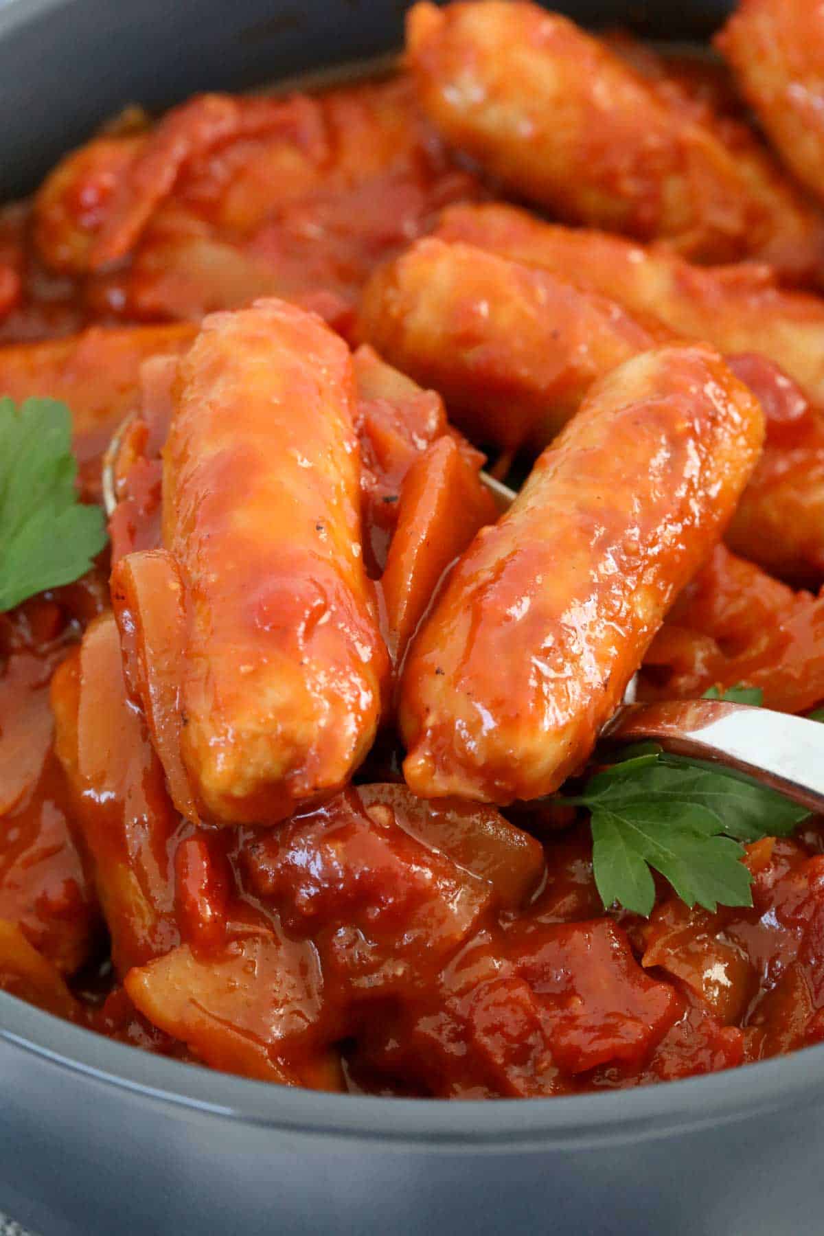 Chipolatas in a tomato based sauce.