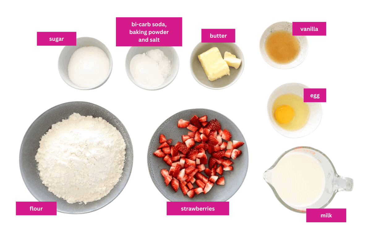 The ingredients for Strawberry Pancakes in small bowls.