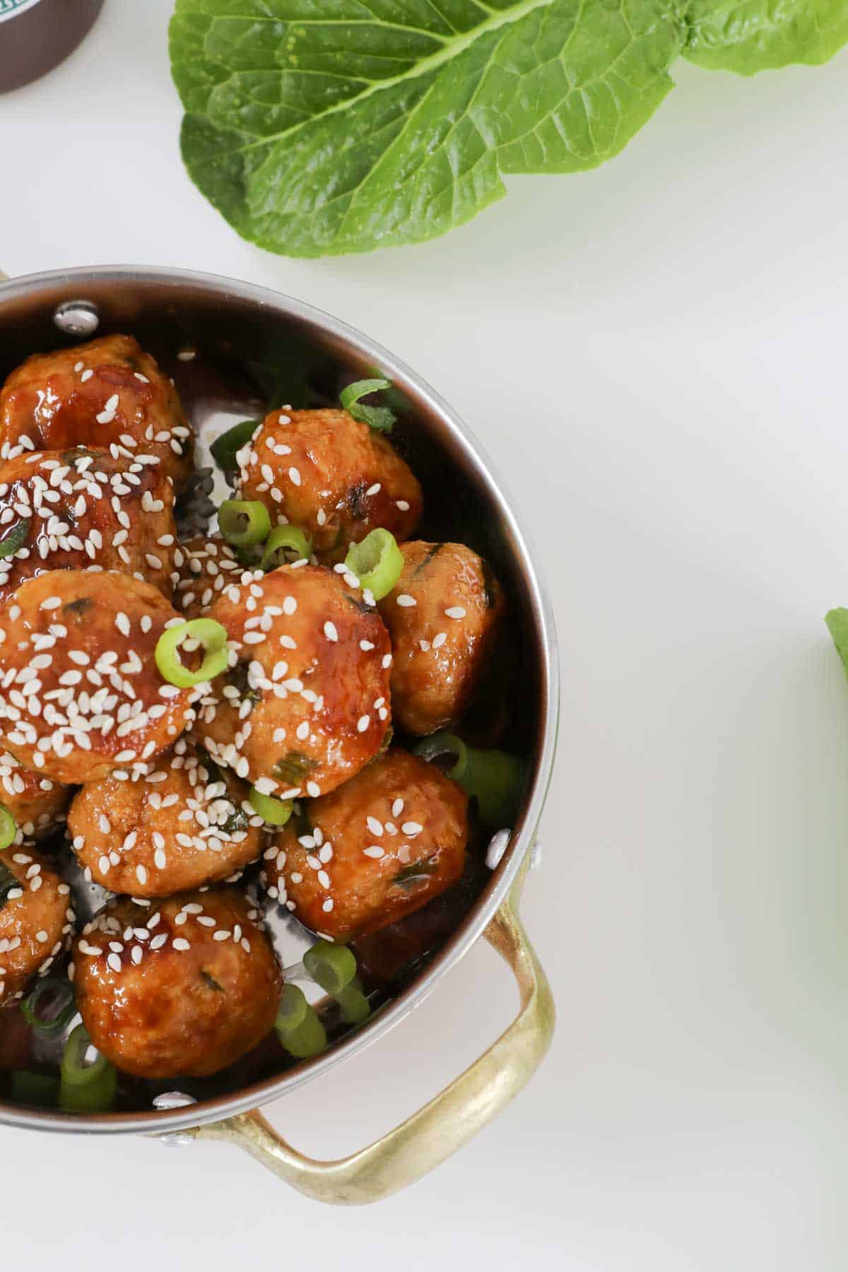 Asian turkey meatballs in a serving dish.