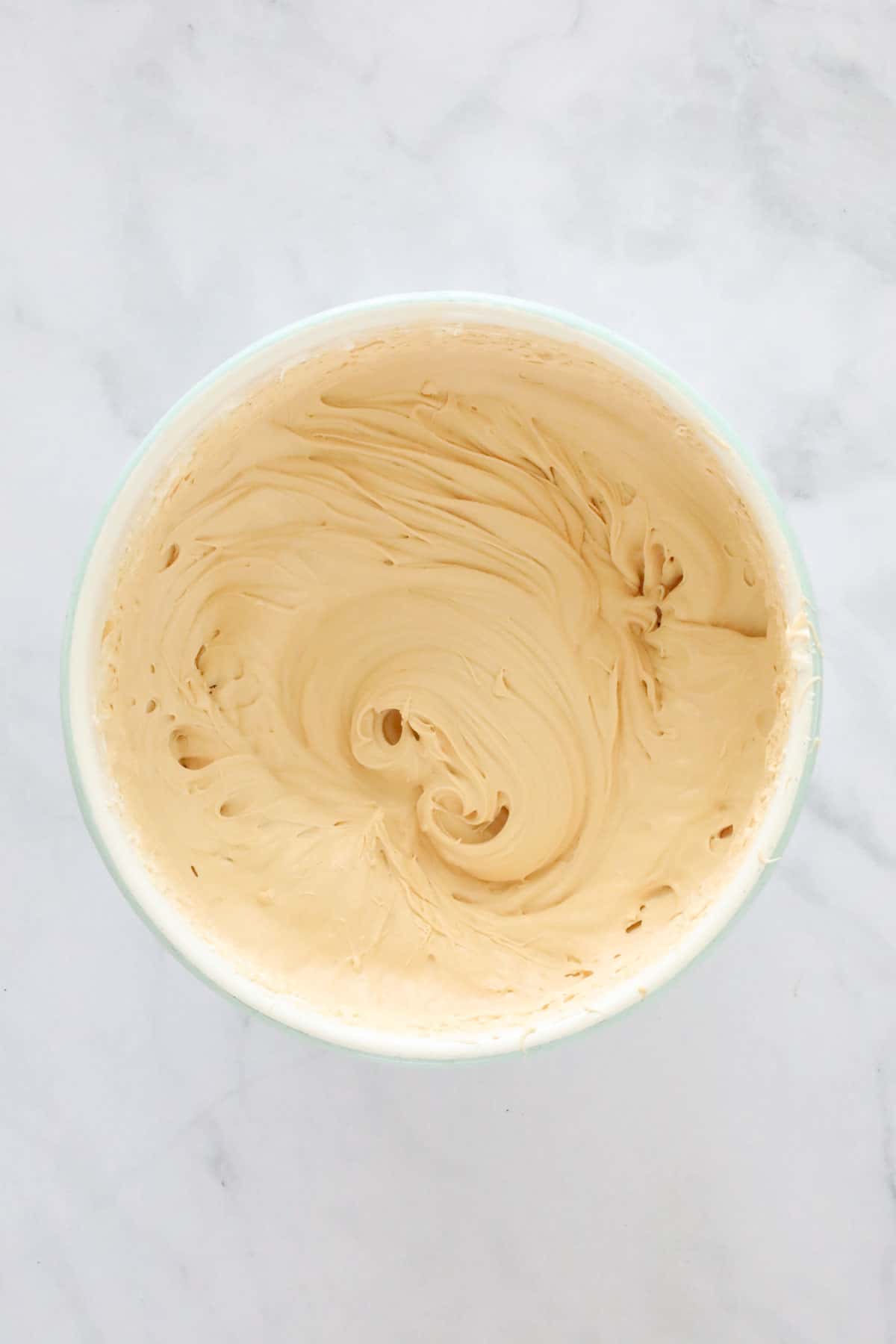 Caramel whipped cream in a bowl.