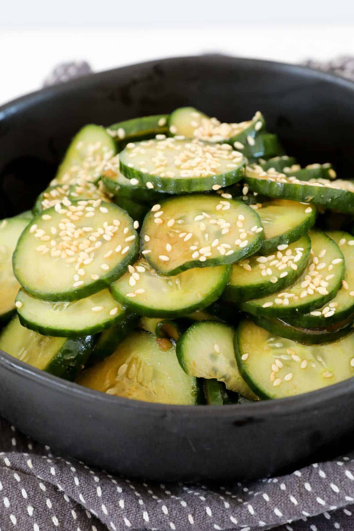 Asian cucumber salad in a serving dish.