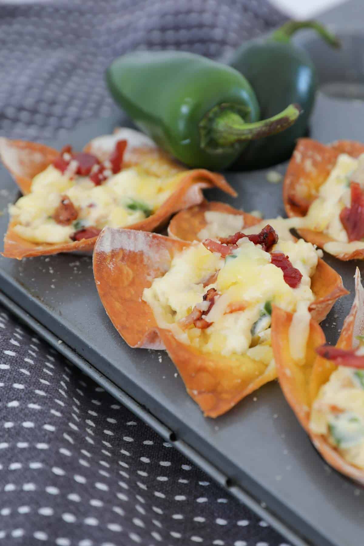 Crispy wonton cups with a spicy filling.