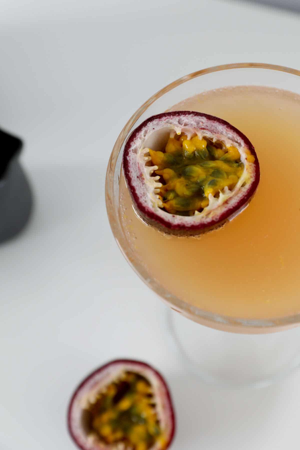 An overhead shot of a passionfruit martini.