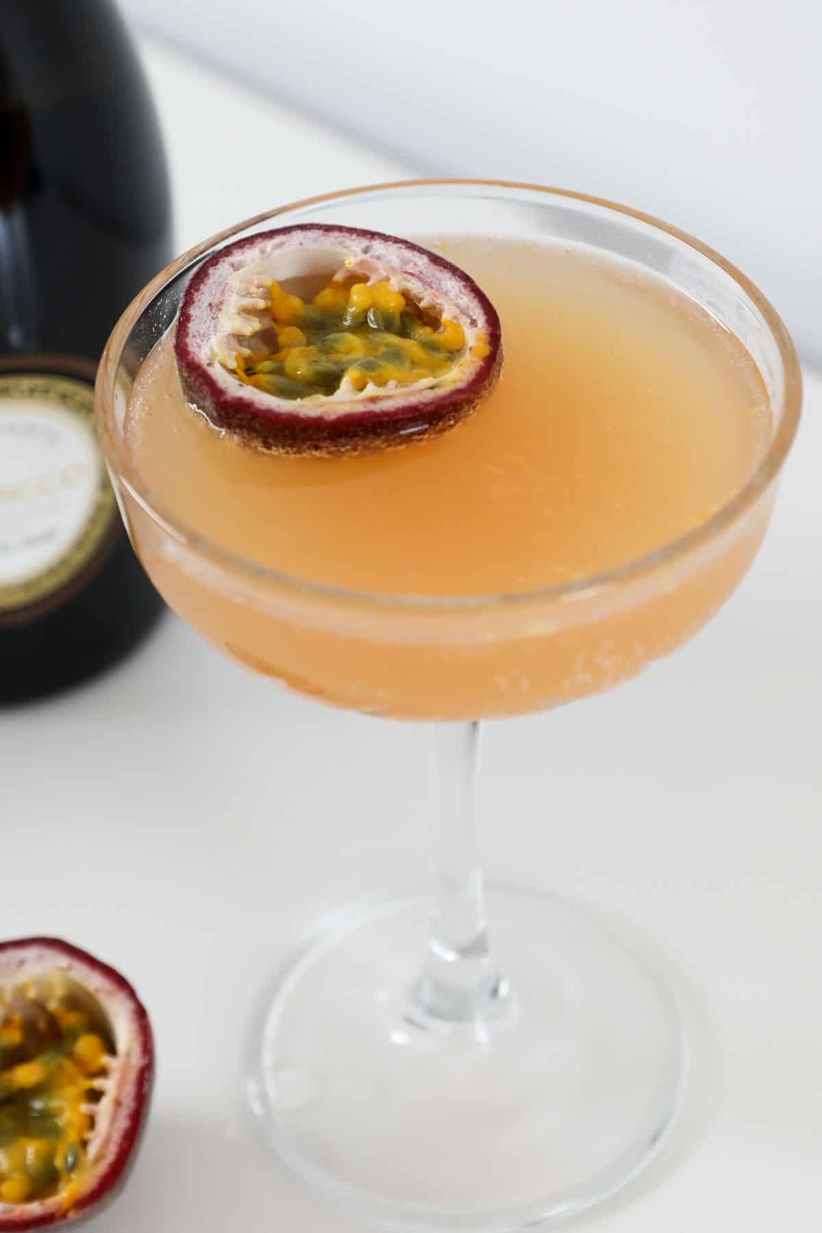 A pornstar cocktail with a fresh passionfruit.
