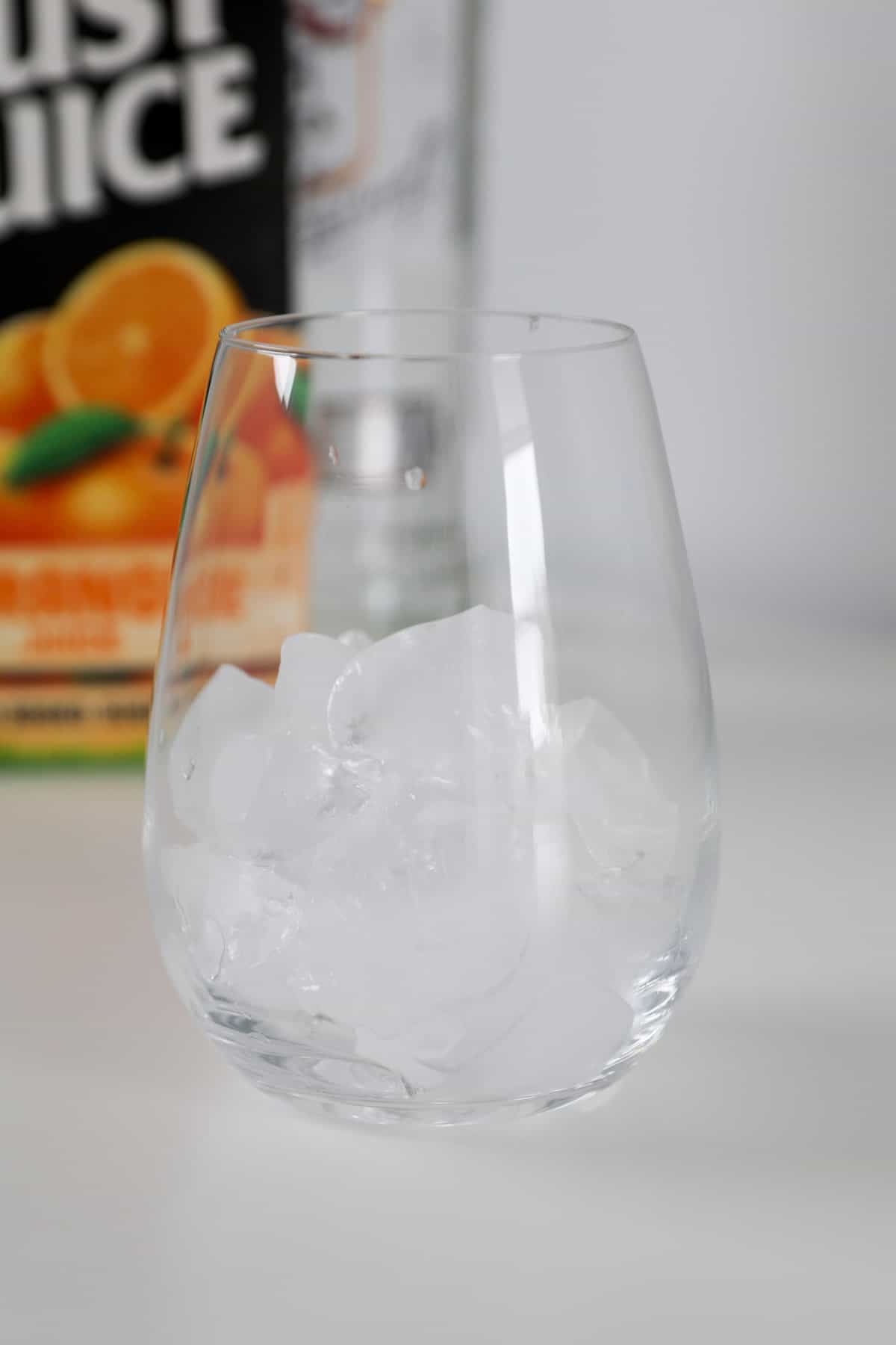 Ice in a glass tumbler.