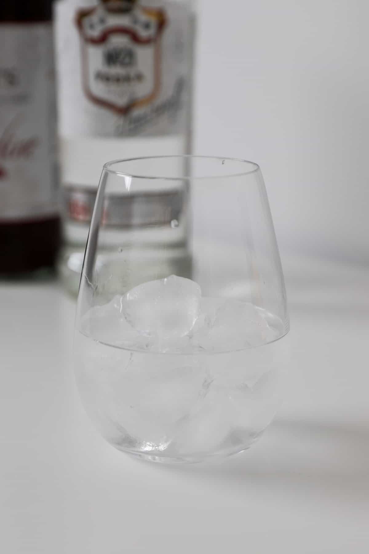 Vodka and ice in a glass.