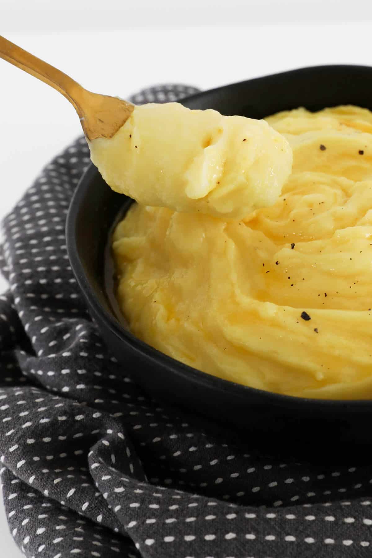 A spoonful of homemade mashed potato.