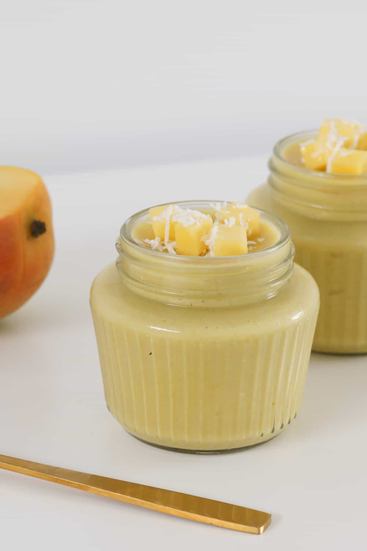 A fruity dessert in individual jars.