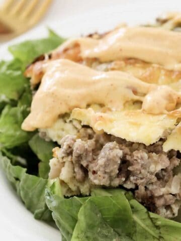 A low carb beef casserole with cheese, lettuce and dressing