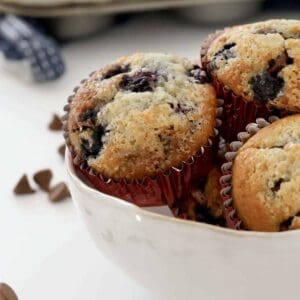 Muffins with a sugar topping in a bowl.