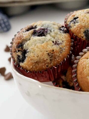 Muffins with a sugar topping in a bowl.