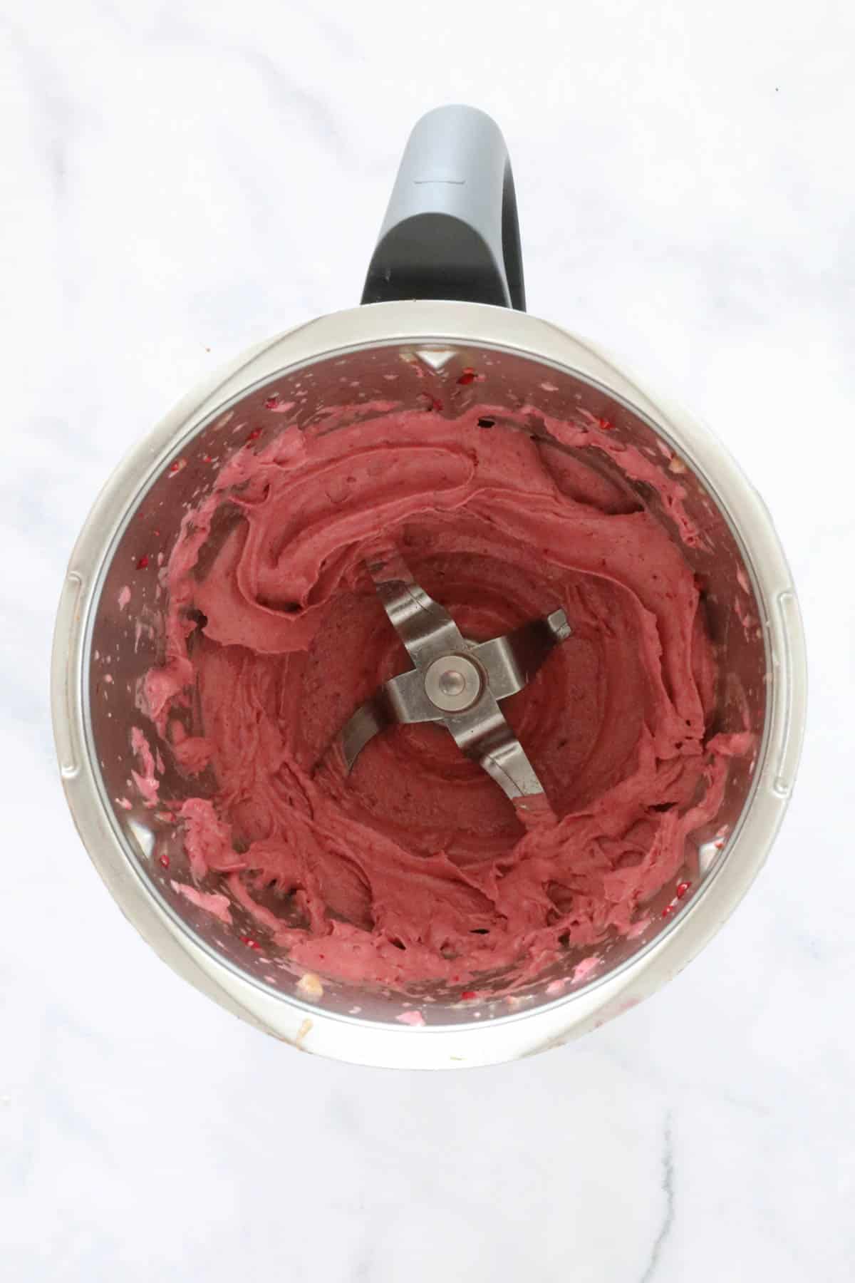 Raspberry icy soft-serve in a Thermomix.