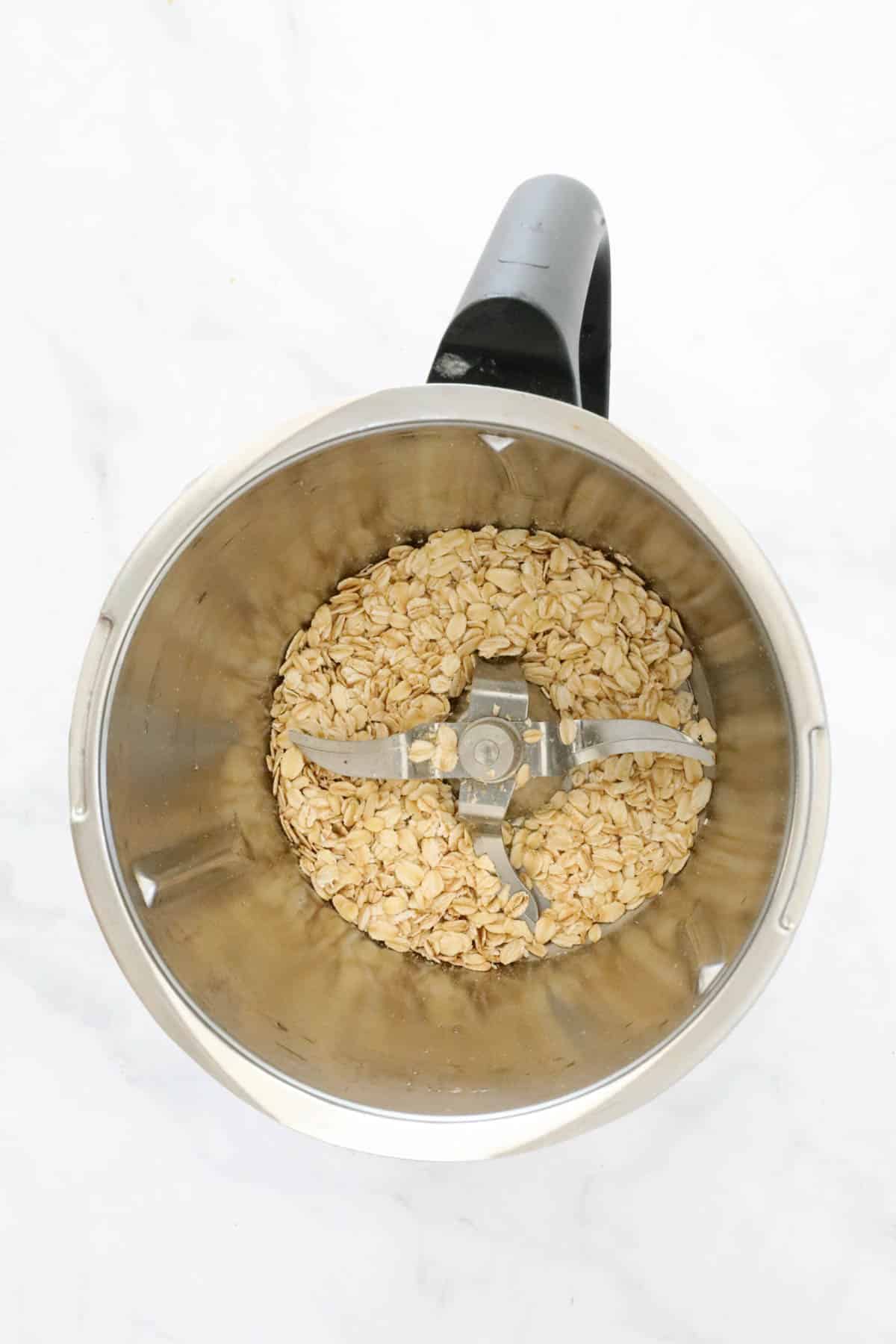 Rolled oats in the bottom of a blender.