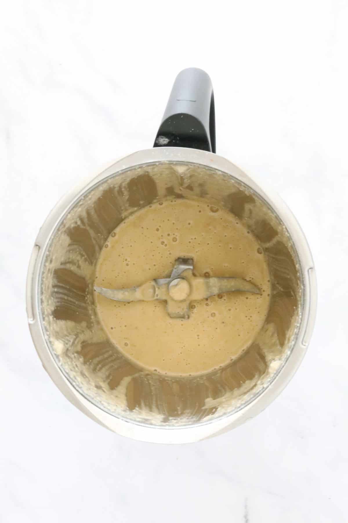 Blended pancake batter in a blender.