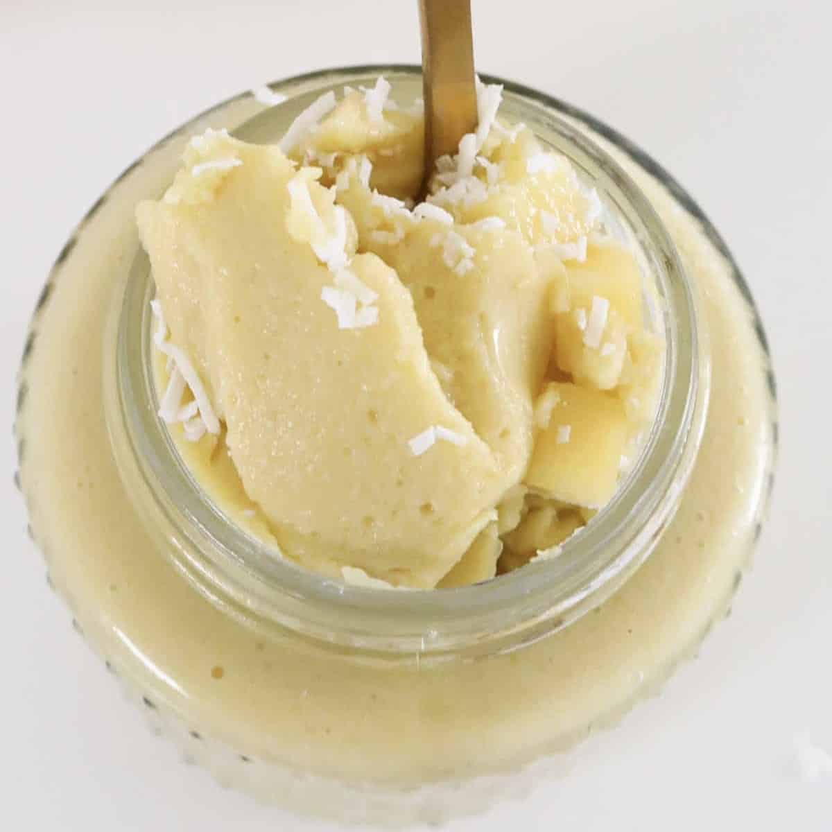 An overhead shot of a soft creamy chilled mango pudding.