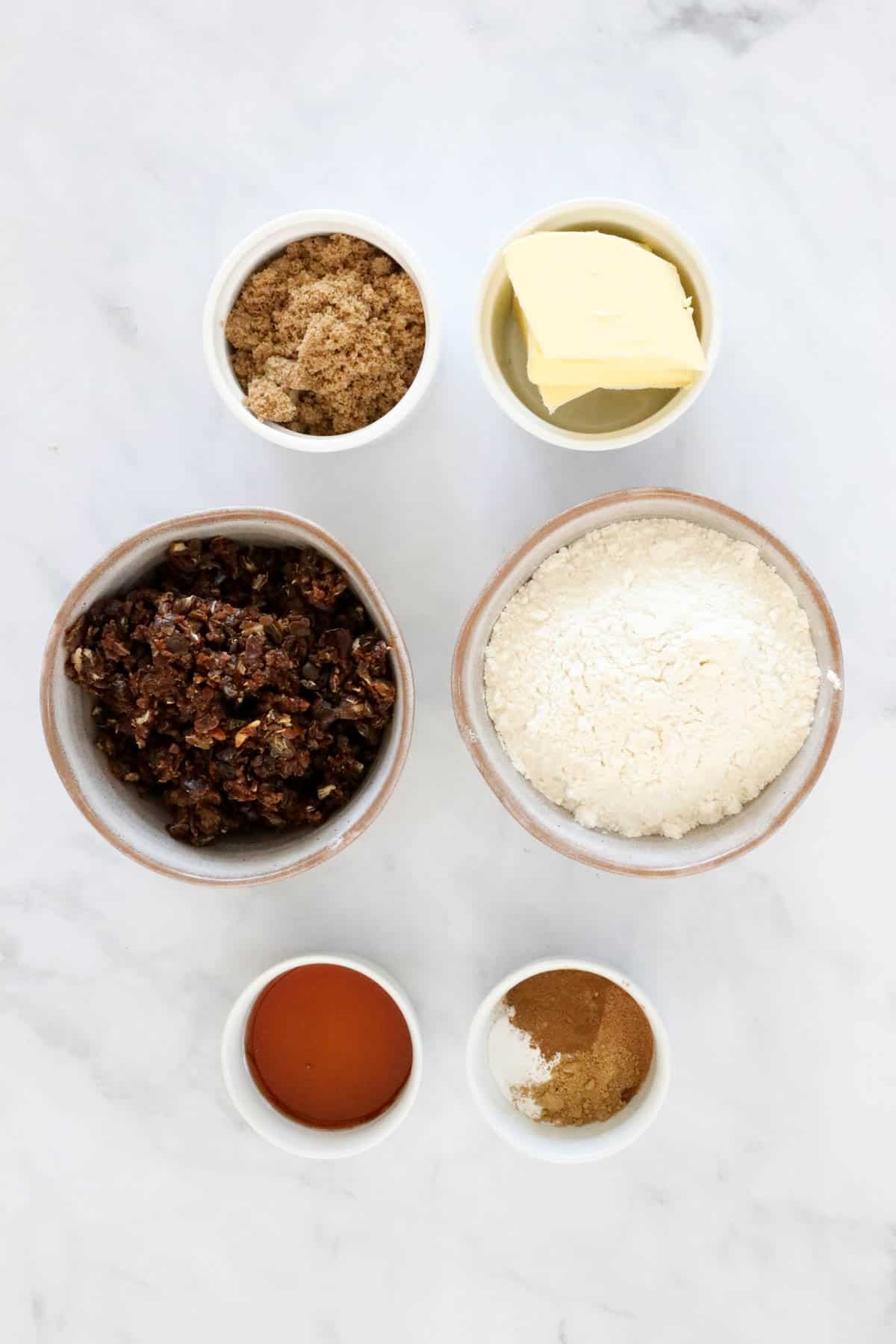Ingredients needed to make the cookies weighed and placed in individual bowls.