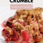 A close up of a serve of strawberry crumble.