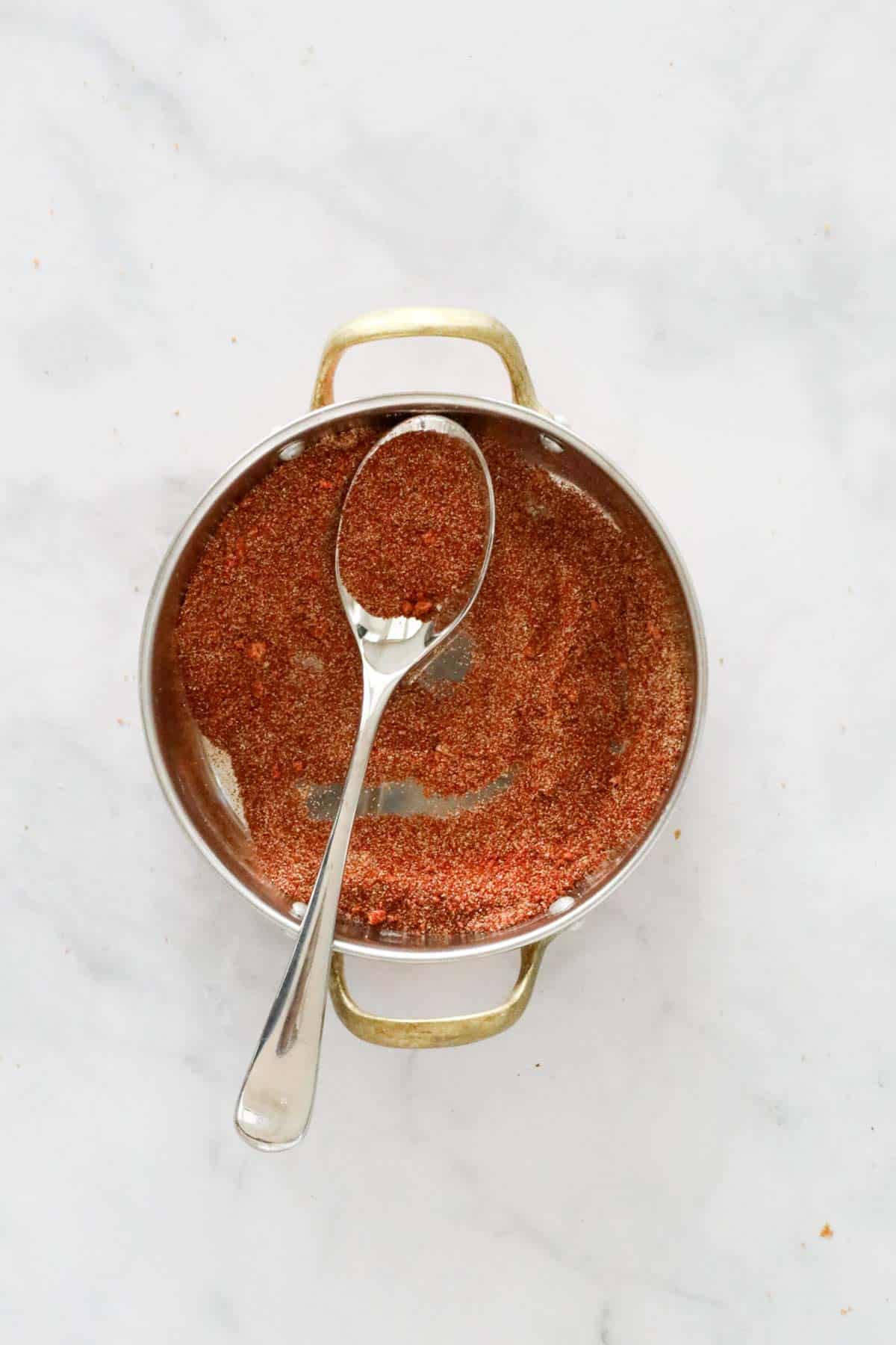 A spice mix in a bowl.