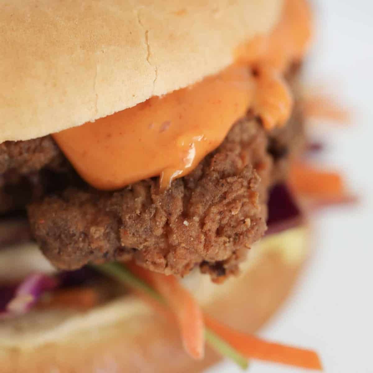 An ultra crispy fried chicken fillet in a burger bun.