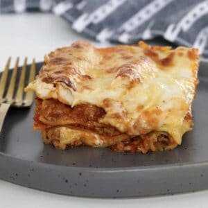 A piece of beef mince lasagne.