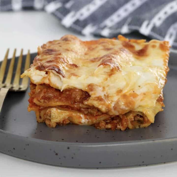 A piece of beef mince lasagne.