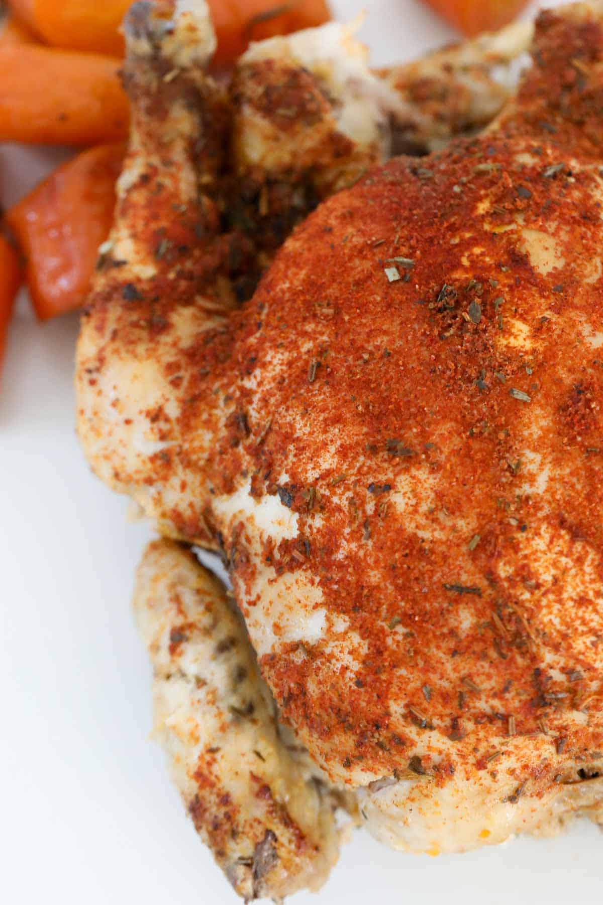 A whole roast chicken cooked in a slow cooker.