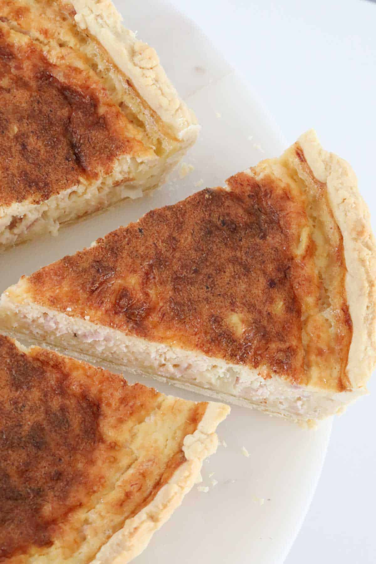 An overhead shot of a piece of Thermomix Quiche Lorraine.