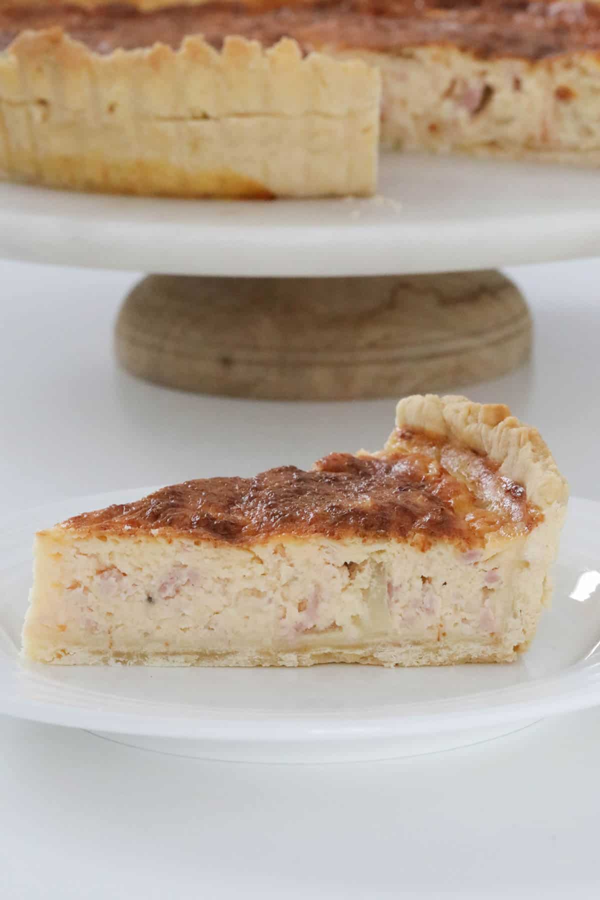 A serve of Thermomix quiche lorraine on a plate.