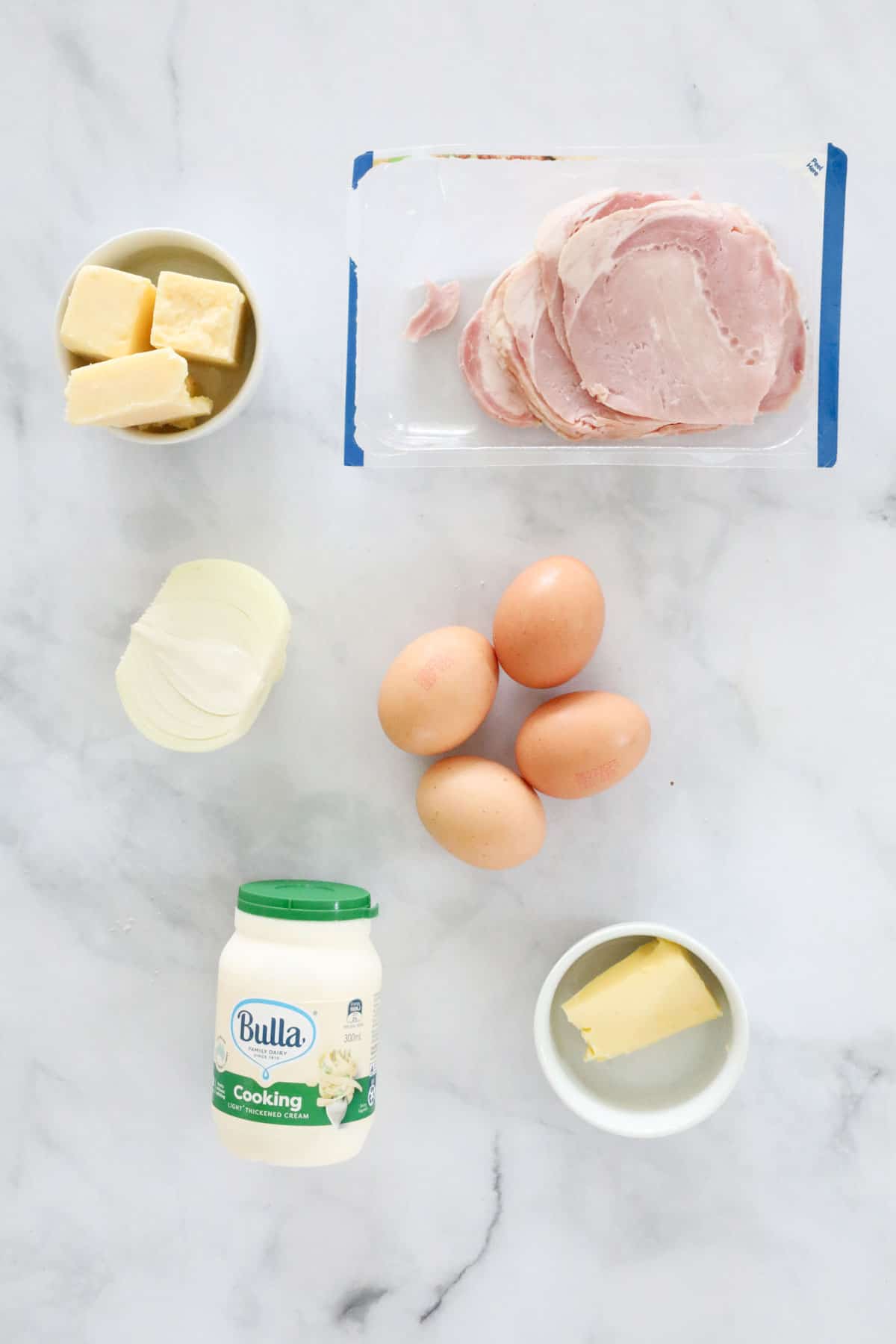 The ingredients for an egg and bacon quiche.