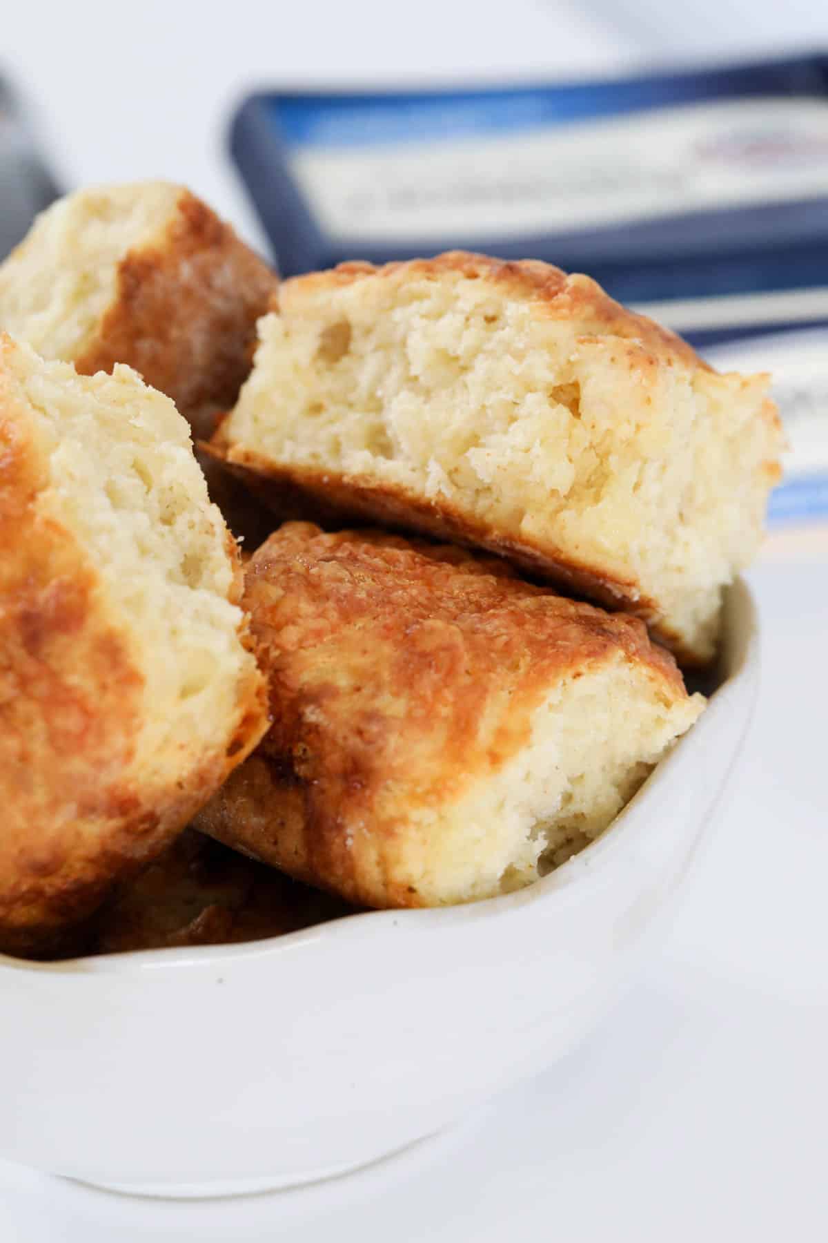 A batch of cheese scones in a serving dish.