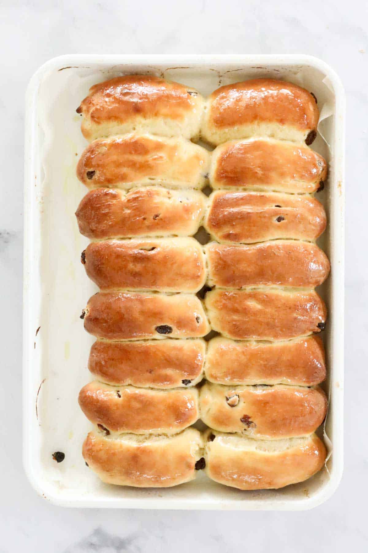 The baked finger buns in the baking dish.