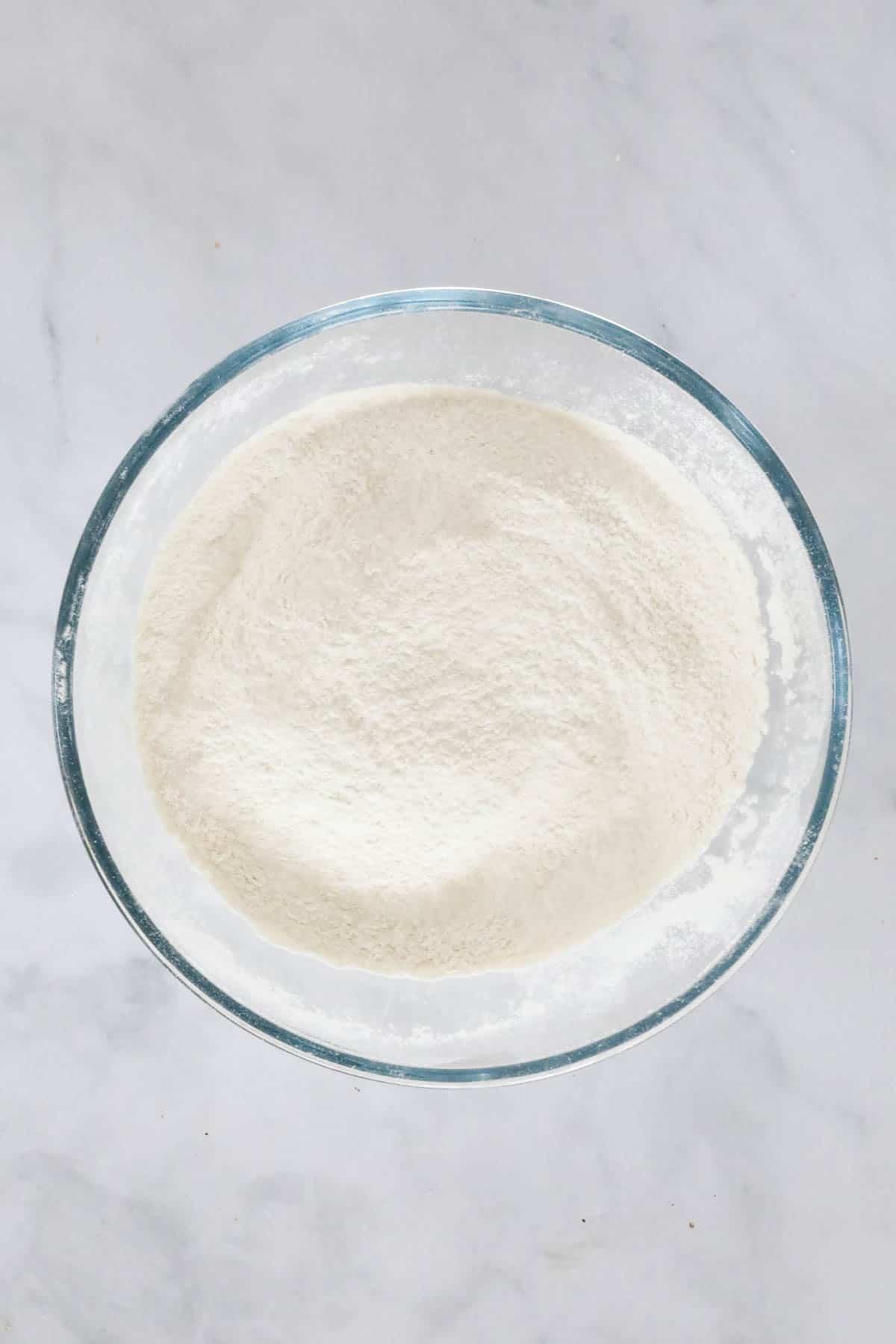 Sifted flour in a large mixing bowl.