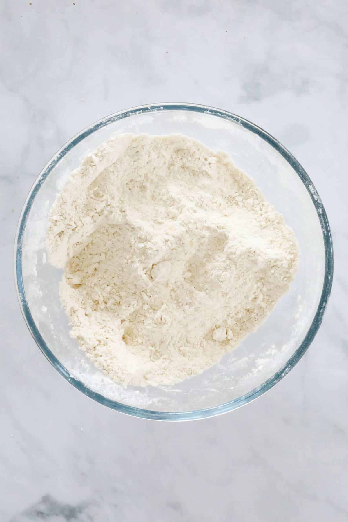 Butter rubbed into the flour until it resembles breadcrumbs.