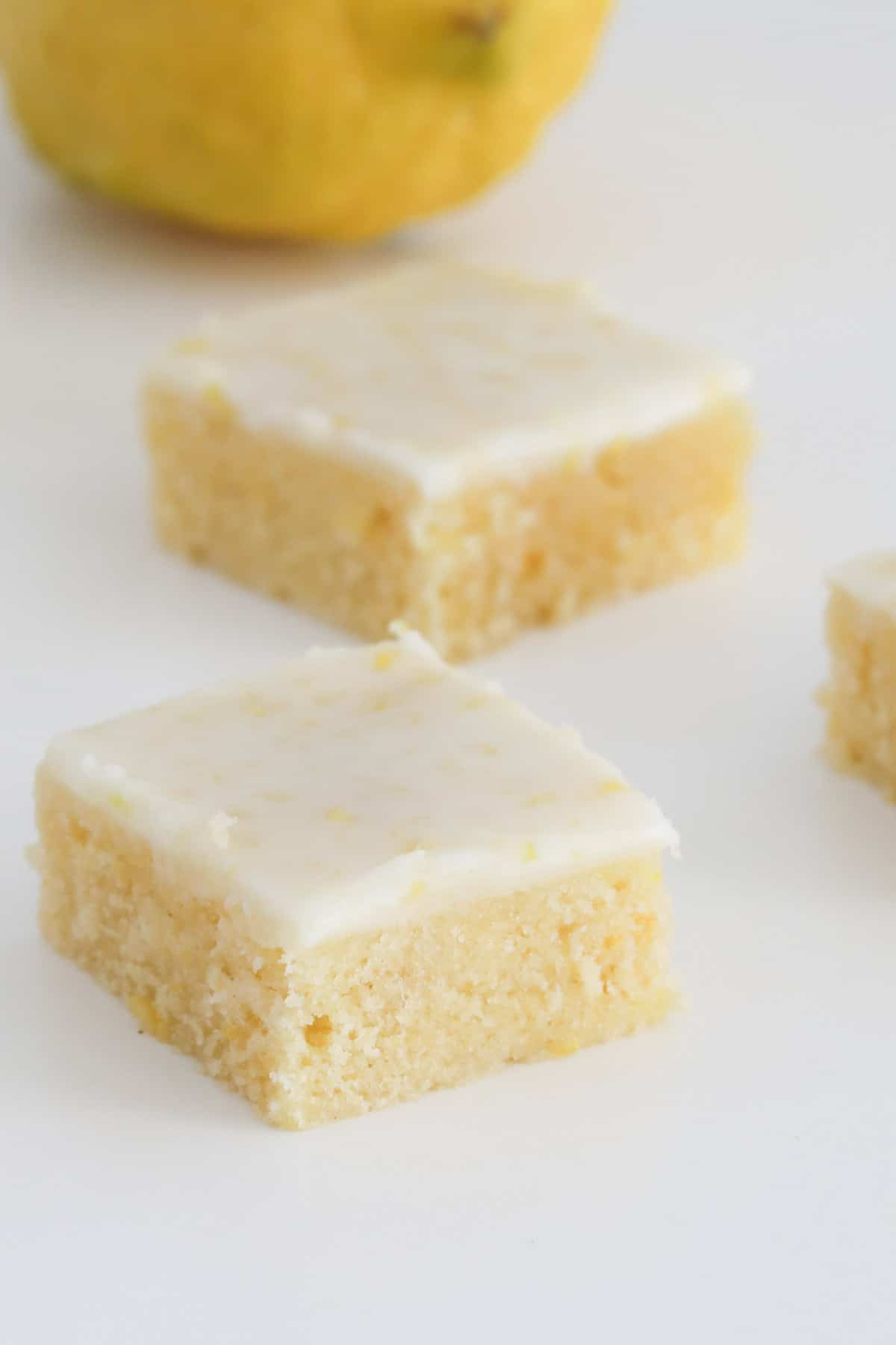Close up of a square of lemon blondie.