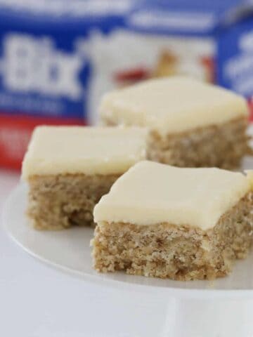 Pieces of baked Weet Bix slice topped with lemon frosting.