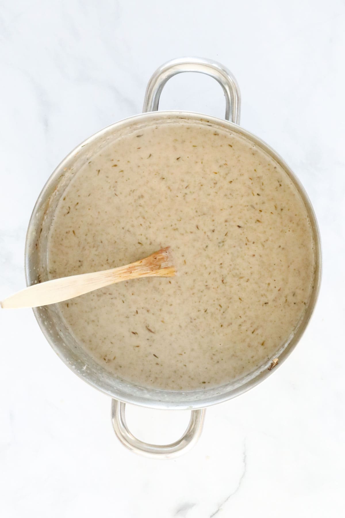 The blended soup in the pan.