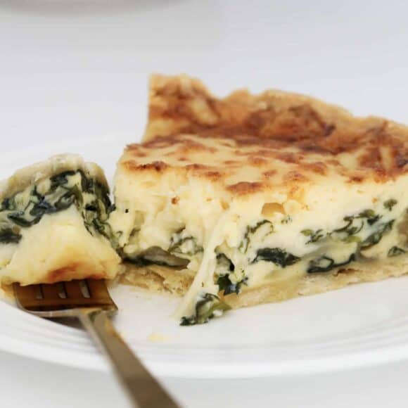 Oozy gooey cheese and spinach quiche.