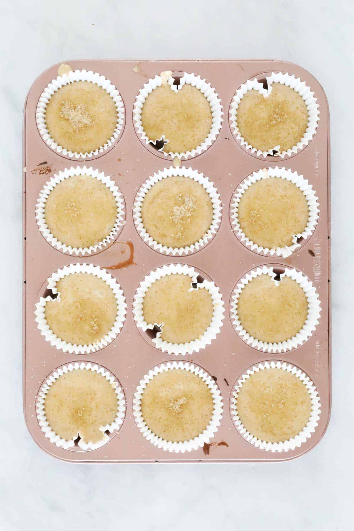 Banana muffins in a muffin tray.
