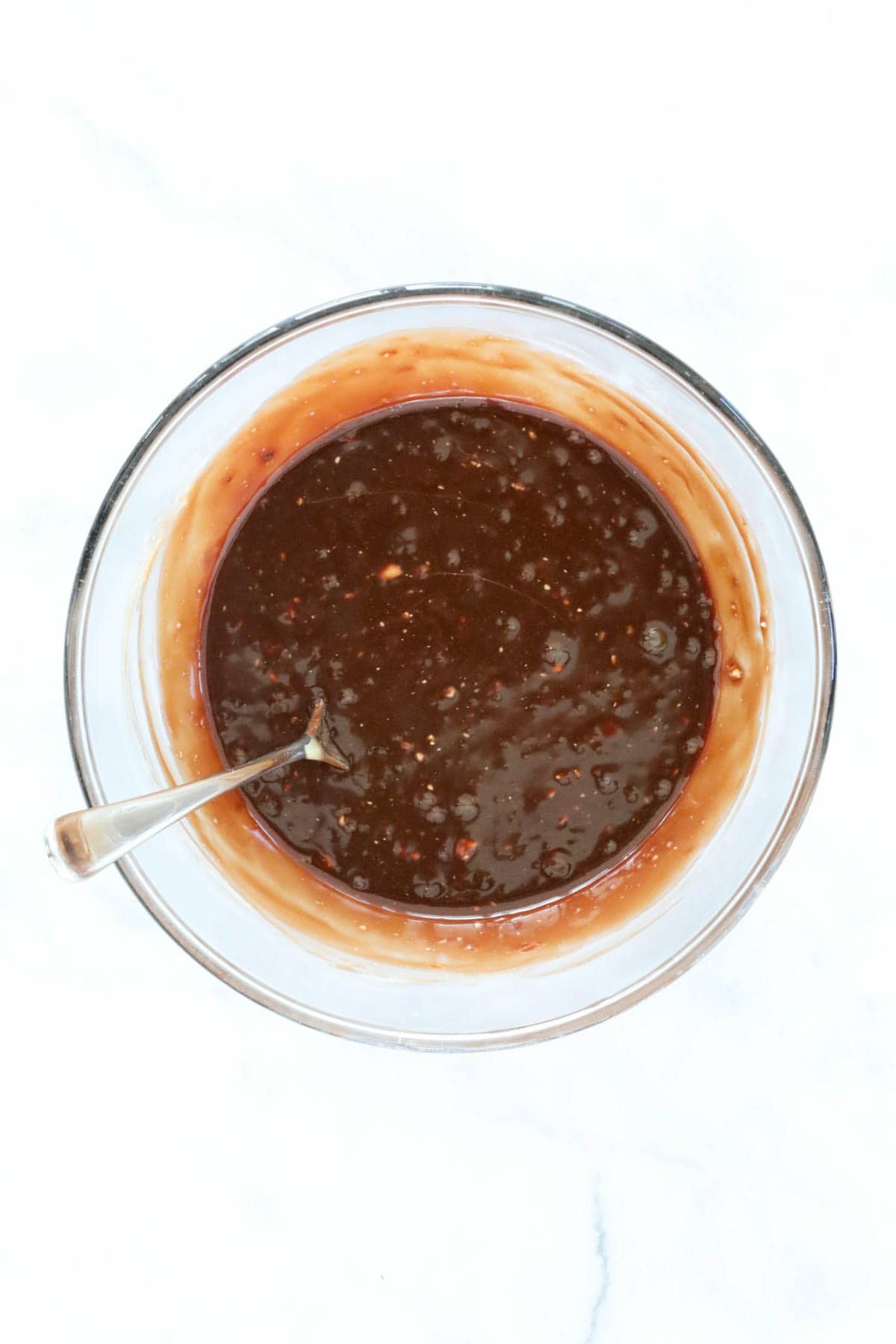 The melted chocolate cream mixture.